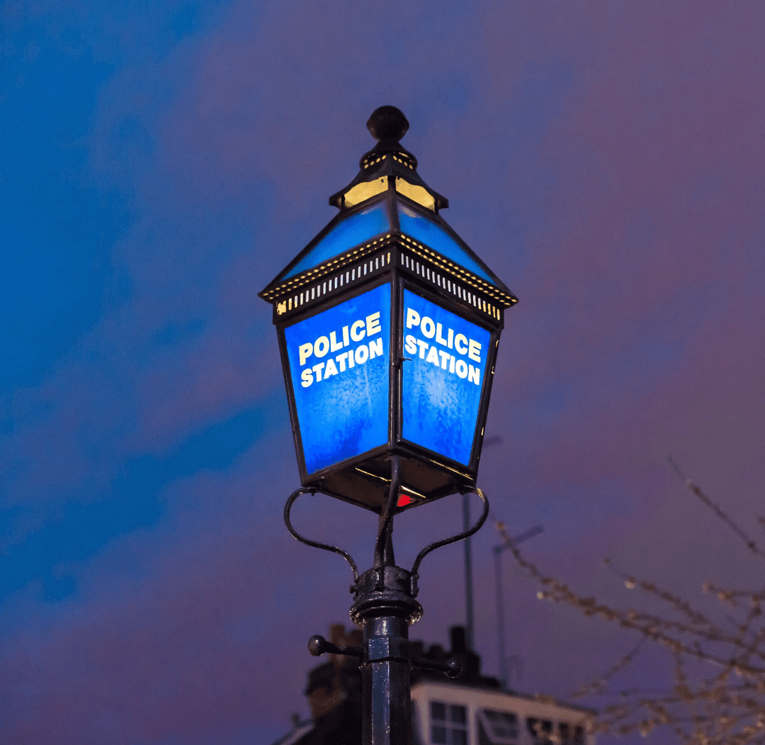The top of a police lamp post